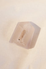 Natural banded agate point for wellness