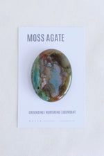 Polished moss agate thumb stone