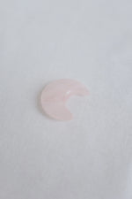 Rose quartz crystal in moon shape