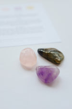 Packet of crystals for anxiety, containing soothing stones to help reduce stress and promote a sense of calm.