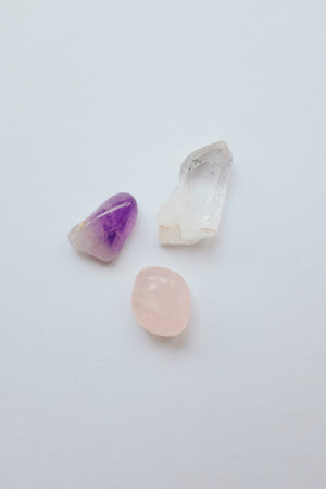 Packet of crystals for car protection, including stones believed to provide safety and protection during travel.